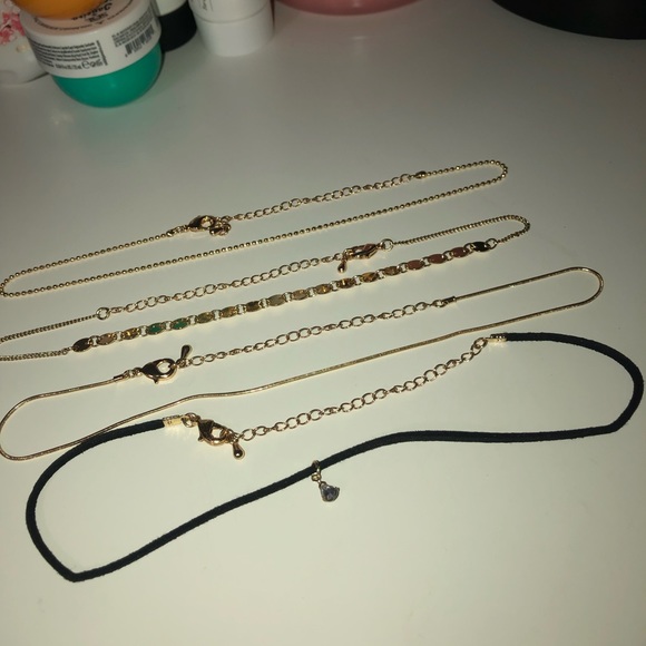 FOUR PIECE LAYERED NECKLACES